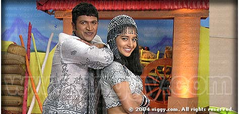 Puneeth and Meera Jasmine in film Mourya