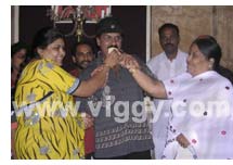 Ravichandran with his wife (left) and mother (right)